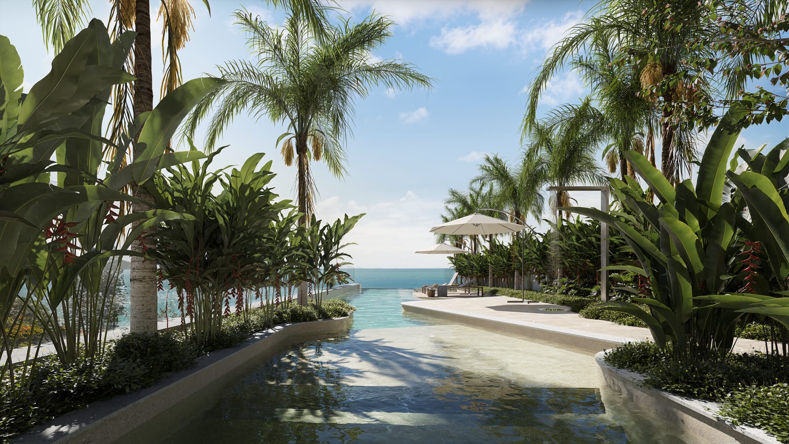 Piscina de borda infinita com prainha, vegetação tropical densa e o mar na linha do horizonte