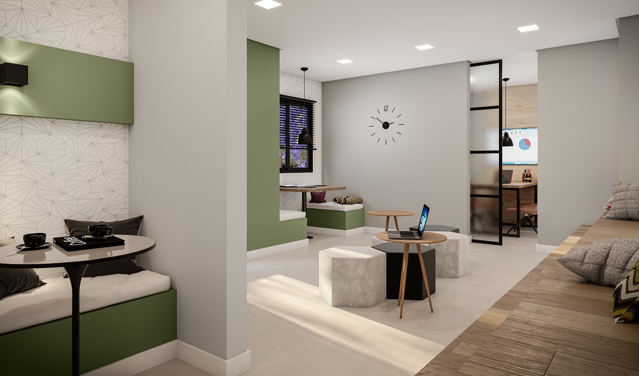 Espaco de coworking em area comum de condominio residencial, com mesas compartilhadas e cadeiras